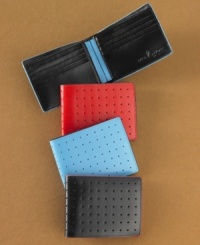 With a sleek style and a pop of color, this wallet from Will Snyder for J. Fold blends modern utility with modern art. With a sleek style and a pop of color, this wallet from Will Snyder for J. Fold blends modern utility with modern art.