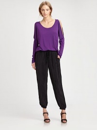 Irresistibly soft jersey top with dropped cutout shoulders, dolman sleeves and a length that hits below the hips. ScoopneckDropped cutout shouldersLong dolman sleevesFront patch pocketLonger length hits below the hips50% modal/50% supima cottonMachine washMade in USA of imported fabricModel shown is 5'9 (176cm) wearing US size Small. Irresistibly soft jersey top with dropped cutout shoulders, dolman sleeves and a length that hits below the hips. ScoopneckDropped cutout shouldersLong dolman sleevesFront patch pocketLonger length hits below the hips50% modal/50% supima cottonMachine washMade in USA of imported fabricModel shown is 5'9 (176cm) wearing US size Small.