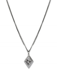 Diamond shapes double up to dazzling effect on this pendant from Kenneth Cole New York. Crafted from silver-tone mixed metal, the pendant also features shimmering glass crystal accents. Approximate length: 16 inches + 3-inch extender. Approximate drop: 1-2/5 inches.