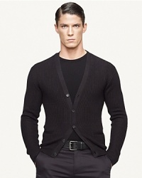 The pinnacle of sartorial style, a sophisticated V-neck cardigan is jersey-knit in supremely soft cashmere for a modern look. The pinnacle of sartorial style, a sophisticated V-neck cardigan is jersey-knit in supremely soft cashmere for a modern look.