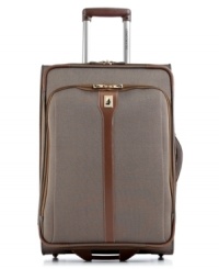 The travelin' is easy! Durable and lightweight, this stylish essential sits on 4 easy-glide wheels and has an expandable design, so everything from prepping to jetting away is simple. Open this versatile piece for a world of packing possibility, such as a unique suiter clip to keep clothes hanging neatly, shoe pockets to keep organization in place and zippered storage pockets to create a space for every accessory. 10-year warranty. The travelin' is easy! Durable and lightweight, this stylish essential sits on 4 easy-glide wheels and has an expandable design, so everything from prepping to jetting away is simple. Open this versatile piece for a world of packing possibility, such as a unique suiter clip to keep clothes hanging neatly, shoe pockets to keep organization in place and zippered storage pockets to create a space for every accessory. 10-year warranty.