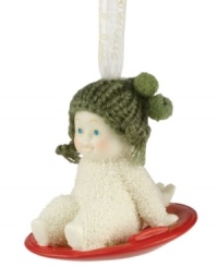 Come on, it's lovely weather! Crafted of pure bisque porcelain, this precious ornament is hand-painted and continues the Snowbabies tradition of lasting childhood innocence and joy. Fine knitted detailing enhances its lovable charm. Come on, it's lovely weather! Crafted of pure bisque porcelain, this precious ornament is hand-painted and continues the Snowbabies tradition of lasting childhood innocence and joy. Fine knitted detailing enhances its lovable charm.