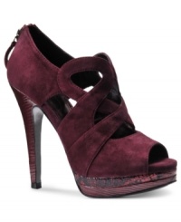 With cutouts, a back zipper, and snake skin accents on the platform, Isola's Dallan pumps are a super-cute, ultra-trendy addition to your shoe collection. With cutouts, a back zipper, and snake skin accents on the platform, Isola's Dallan pumps are a super-cute, ultra-trendy addition to your shoe collection.