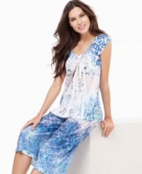 Sweet and colorful. One World's Sweetheart mesh trim top and cropped pajama pants set is a great balance of bright color, pattern and comfort. Sweet and colorful. One World's Sweetheart mesh trim top and cropped pajama pants set is a great balance of bright color, pattern and comfort.