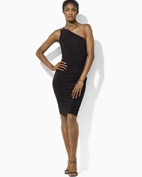 An elegantly ruched evening dress is rendered in figure-flattering matte jersey and adorned with a dazzling crystal-encrusted brooch at the shoulder. An elegantly ruched evening dress is rendered in figure-flattering matte jersey and adorned with a dazzling crystal-encrusted brooch at the shoulder.