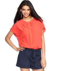 MM Couture's fluid top features a sweet bow and a unique vertical pleat in the front! MM Couture's fluid top features a sweet bow and a unique vertical pleat in the front!