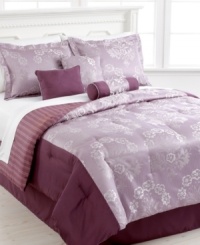 Purple passion. An enchanting pattern of floral medallions on a ground of tonal purple stripes renders a lustrous sheen in this jacquard woven Gallinda comforter set. Center panel is bordered on two sides by bands of solid purple and comforter reverses to an allover vertical stripe pattern. Shams, bedskirt and decorative pillows complete this captivating look. Purple passion. An enchanting pattern of floral medallions on a ground of tonal purple stripes renders a lustrous sheen in this jacquard woven Gallinda comforter set. Center panel is bordered on two sides by bands of solid purple and comforter reverses to an allover vertical stripe pattern. Shams, bedskirt and decorative pillows complete this captivating look.