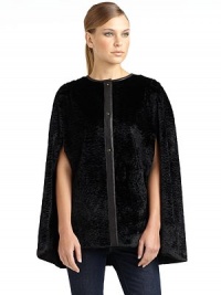 THE LOOKPlush faux fur in a swirly textureSmooth contrast trim along the neck and center placketFront pin closureCape sleevesTHE FITAbout 27 from shoulder to hemTHE MATERIALFaux fur: viscoseBacking: viscose/cotton/modalCARE & ORIGINDry cleanImportedModel shown is 5'11 (180cm) wearing US size Small. THE LOOKPlush faux fur in a swirly textureSmooth contrast trim along the neck and center placketFront pin closureCape sleevesTHE FITAbout 27 from shoulder to hemTHE MATERIALFaux fur: viscoseBacking: viscose/cotton/modalCARE & ORIGINDry cleanImportedModel shown is 5'11 (180cm) wearing US size Small.
