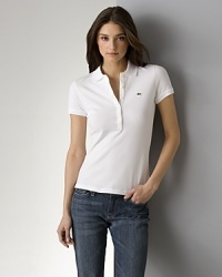 Five button polo with crocodile logo. Pulls on over head. Made in USA and Imported. Misses' 2-14. Five button polo with crocodile logo. Pulls on over head. Made in USA and Imported. Misses' 2-14.