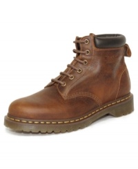 This pair of men's boots is constructed with bold leather panels and finished with a chunky rubber sole. These durable Dr. Martens boots for men provide a solid foundation for any laid-back look. This pair of men's boots is constructed with bold leather panels and finished with a chunky rubber sole. These durable Dr. Martens boots for men provide a solid foundation for any laid-back look.