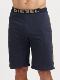 A casual elongated version with logo waistband and contrast piping. Elastic logo waistbandHits above kneeInseam, about 8CottonMachine washImported A casual elongated version with logo waistband and contrast piping. Elastic logo waistbandHits above kneeInseam, about 8CottonMachine washImported