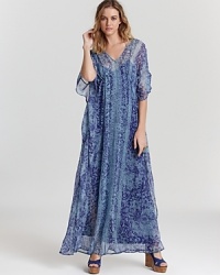 Ella Moss masters bohemian elegance with this caftan-inspired maxi dress, imbued with an eclectic print. Ella Moss masters bohemian elegance with this caftan-inspired maxi dress, imbued with an eclectic print.