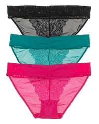 A sheer bikini with a swirling floral lace overlay, a delicate and charming style from b.tempt'd. A sheer bikini with a swirling floral lace overlay, a delicate and charming style from b.tempt'd.