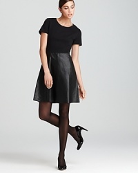 The word luxe is in leather this season. Try out the trend with this DKNY dress pairing a sleek knit bodice with a flared leather skirt for a pretty-in-punk look. The word luxe is in leather this season. Try out the trend with this DKNY dress pairing a sleek knit bodice with a flared leather skirt for a pretty-in-punk look.