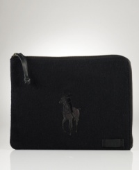 Constructed from durable wool, this lightweight pouch provides a polished home away from home for a treasured tablet.