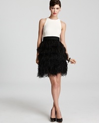 Fashion's favorite color combo gets party-perfect with this Milly dress. Details galore will make this your go-to dress for any affair, from the tiered feather skirt to the back keyhole detail. Fashion's favorite color combo gets party-perfect with this Milly dress. Details galore will make this your go-to dress for any affair, from the tiered feather skirt to the back keyhole detail.