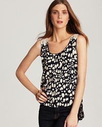 Turn around in this dot-print Vintage Havana tank to reveal a bohemian-chic crochet back.