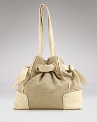 The classic canvas tote gets a hit of cool with this slouchy style from Kooba. Ideal for world travels or trips to the market, it's a easy accessory you'll reach for again and again. The classic canvas tote gets a hit of cool with this slouchy style from Kooba. Ideal for world travels or trips to the market, it's a easy accessory you'll reach for again and again.