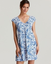 Lauren Ralph Lauren's elegant knit gown with ruching along a V-neckline. Lauren Ralph Lauren's elegant knit gown with ruching along a V-neckline.