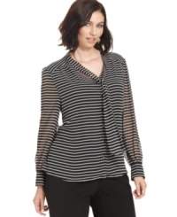 Tie-up a sophisticated work look with Alfani's long sleeve plus size blouse, featuring a striped finish. (Clearance) Tie-up a sophisticated work look with Alfani's long sleeve plus size blouse, featuring a striped finish. (Clearance)