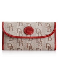 Whether you're a world traveler or simply traveling to work, this Dooney & Bourke design will keep all your affairs impeccably in order. Card slots, billfolds and checkbook holder provide exceptional organization within, while graphic, signature DBs and supple leather trim elegantly adorn the exterior. Whether you're a world traveler or simply traveling to work, this Dooney & Bourke design will keep all your affairs impeccably in order. Card slots, billfolds and checkbook holder provide exceptional organization within, while graphic, signature DBs and supple leather trim elegantly adorn the exterior.