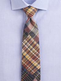 Bold, plaid pattern offers a modern touch to this classic wardrobe essential, handcrafted in luxurious Italian silk.SilkDry cleanMade in Italy Bold, plaid pattern offers a modern touch to this classic wardrobe essential, handcrafted in luxurious Italian silk.SilkDry cleanMade in Italy