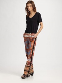 Finished with contrast trim, these voluminous pants have an eye-catching graphic print and fluid silhouette. Button closureZip flySlash pocketsInseam, about 30PolyesterDry cleanMade in USA of imported fabricModel shown is 5'10 (177cm) wearing US size Small. Finished with contrast trim, these voluminous pants have an eye-catching graphic print and fluid silhouette. Button closureZip flySlash pocketsInseam, about 30PolyesterDry cleanMade in USA of imported fabricModel shown is 5'10 (177cm) wearing US size Small.