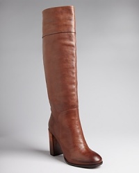 Finding the perfect basic, wear-everywhere boots can be a task: Dolce Vita makes it easy with this sophisticated pair, in sleek leather set on stacked heels. Finding the perfect basic, wear-everywhere boots can be a task: Dolce Vita makes it easy with this sophisticated pair, in sleek leather set on stacked heels.