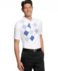A slim fit and classic argyle will make you look like a pro on the green with this Greg Norman for Tasso Elba golf shirt featuring PlayDry® technology. A slim fit and classic argyle will make you look like a pro on the green with this Greg Norman for Tasso Elba golf shirt featuring PlayDry® technology.