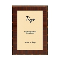 Exquisitely detailed with inlaid marquetry and a high gloss finish, these Italian wood frames offer a perfect way to showcase your pictures. Available in three sizes. Exquisitely detailed with inlaid marquetry and a high gloss finish, these Italian wood frames offer a perfect way to showcase your pictures. Available in three sizes.