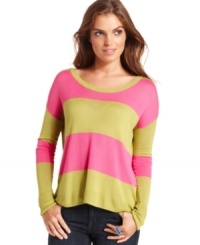 In a slouchy shape, this brightly striped Free People sweater adds color shock to a cold-weather wardrobe! In a slouchy shape, this brightly striped Free People sweater adds color shock to a cold-weather wardrobe!