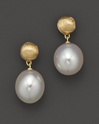 Gleaming freshwater pearls dangle from gorgeously textured 18K yellow gold beads. From the Africa Pearl Collection. Gleaming freshwater pearls dangle from gorgeously textured 18K yellow gold beads. From the Africa Pearl Collection.