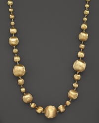 Graduated, hand-engraved 18K yellow gold bead necklace from Marco Bicego.