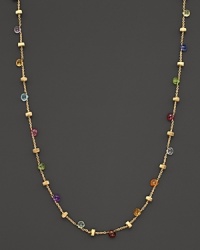 From the Paradise collection, a gold necklace with semi precious stones, designed by Marco Bicego.