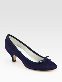 A quietly elegant pump rendered in butter-soft suede, with simple ribbon trim and a lifted heel. Self-covered heel, 2½ (65mm)Suede upper with grosgrain ribbon trimLeather lining and solePadded insoleMade in France A quietly elegant pump rendered in butter-soft suede, with simple ribbon trim and a lifted heel. Self-covered heel, 2½ (65mm)Suede upper with grosgrain ribbon trimLeather lining and solePadded insoleMade in France