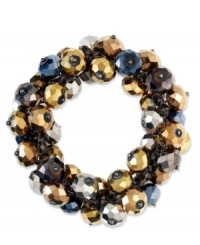 Colorful clusters. This elegant stretch bracelet from c.A.K.e. by Ali Khan features a cluster of multi-color glass rondelles on a stretch cord. Crafted in mixed metal, it stretches to fit wrist. Approximate diameter: 2 inches. Colorful clusters. This elegant stretch bracelet from c.A.K.e. by Ali Khan features a cluster of multi-color glass rondelles on a stretch cord. Crafted in mixed metal, it stretches to fit wrist. Approximate diameter: 2 inches.