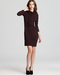 Constructed in cotton with a fashionable funnel neck, this James Perse dress makes getting dressed a breeze. Constructed in cotton with a fashionable funnel neck, this James Perse dress makes getting dressed a breeze.