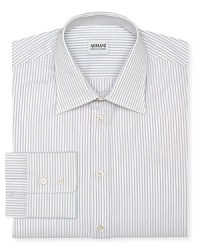 This refreshing take on a classic stripe shirt offers a contemporary fit in superior Italian cotton for a truly refined masterpiece from Armani Collezioni. This refreshing take on a classic stripe shirt offers a contemporary fit in superior Italian cotton for a truly refined masterpiece from Armani Collezioni.