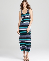 Sport the quintessential summer look: bold stripes on a lightweight Aqua maxi dress--perfect poolside or for a jaunt to the park. Sport the quintessential summer look: bold stripes on a lightweight Aqua maxi dress--perfect poolside or for a jaunt to the park.