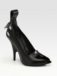 High-fashion leather style with an extended pull tab and a unique peep toe with a built-in toe ring and sculpted heel. Self-covered heel, 4Leather upperLeather lining and solePadded insoleImported High-fashion leather style with an extended pull tab and a unique peep toe with a built-in toe ring and sculpted heel. Self-covered heel, 4Leather upperLeather lining and solePadded insoleImported