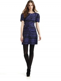 THE LOOKRoundneckPuffed short sleevesBack zip closureBust dartsStructured ruched skirtTHE FITAbout 34 from shoulder to hemTHE MATERIAL53% polyester/43% virgin wool/4% other fibersFully linedCARE & ORIGINDry cleanMade in USAModel shown is 5'10 (177cm) wearing US size 4. THE LOOKRoundneckPuffed short sleevesBack zip closureBust dartsStructured ruched skirtTHE FITAbout 34 from shoulder to hemTHE MATERIAL53% polyester/43% virgin wool/4% other fibersFully linedCARE & ORIGINDry cleanMade in USAModel shown is 5'10 (177cm) wearing US size 4.