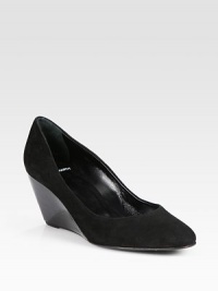 Tried-and-true suede pump with an unexpected patent leather wedge. Patent leather wedge, 3 (75mm)Suede upperLeather lining and solePadded insoleMade in ItalyOUR FIT MODEL RECOMMENDS ordering one size up as this style runs small. 