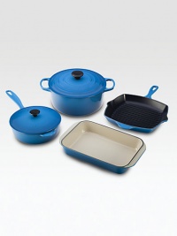 This essential collection of Le Creuset cast iron is perfect for newlyweds or a new kitchen. Durable stoneware evenly distributes and retains heat. This essential collection of Le Creuset cast iron is perfect for newlyweds or a new kitchen. Durable stoneware evenly distributes and retains heat.