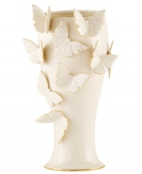 The essence of whimsy, this Lenox Flutter vase will lift your spirits with gold-tipped butterflies and elegant banding in timeless ivory porcelain. The essence of whimsy, this Lenox Flutter vase will lift your spirits with gold-tipped butterflies and elegant banding in timeless ivory porcelain.