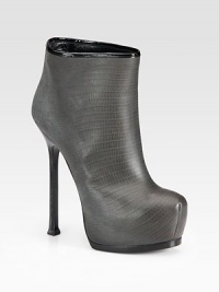 An always chic style of lizard-embossed leather, with a towering heel and patent leather trim. Stacked heel, 5½ (140mm)Hidden wooden platform, 1½ (40mm)Compares to a 4 heel (100mm)Lizard-embossed leather upper with patent leather trimPull-on styleLeather lining and solePadded insoleMade in Italy An always chic style of lizard-embossed leather, with a towering heel and patent leather trim. Stacked heel, 5½ (140mm)Hidden wooden platform, 1½ (40mm)Compares to a 4 heel (100mm)Lizard-embossed leather upper with patent leather trimPull-on styleLeather lining and solePadded insoleMade in Italy