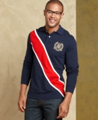 Put a new angle on sporty style with this pieced rugby shirt from Tommy Hilfiger. Put a new angle on sporty style with this pieced rugby shirt from Tommy Hilfiger.