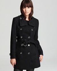 Clean lines and classic tailoring imbue the essential Burberry Brit trench coat with effortless sophistication. Clean lines and classic tailoring imbue the essential Burberry Brit trench coat with effortless sophistication.