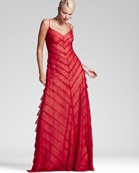 Take a prime position on the dance floor in Tadashi Shoji's Flamenco-inspired lace gown, rendered in a vibrant flame hue. Take a prime position on the dance floor in Tadashi Shoji's Flamenco-inspired lace gown, rendered in a vibrant flame hue.