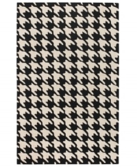 Houndstooth hip. Add some contemporary chic to your home with Surya's Cosmopolitan area rug. Hand-tufted of strong, no-shed polyacrylic in a graphic houndstooth print, this rug is the epitome of urban cool. The pairing of black and ecru offers a sophisticated look that's always in style. Houndstooth hip. Add some contemporary chic to your home with Surya's Cosmopolitan area rug. Hand-tufted of strong, no-shed polyacrylic in a graphic houndstooth print, this rug is the epitome of urban cool. The pairing of black and ecru offers a sophisticated look that's always in style.
