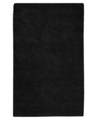 Nothing creates a more luxurious foundation than a rich, felted wool rug in sophisticated black. This plush piece features an undeniably soft hand, created with the finest hand-woven New Zealand wool. Nothing creates a more luxurious foundation than a rich, felted wool rug in sophisticated black. This plush piece features an undeniably soft hand, created with the finest hand-woven New Zealand wool.